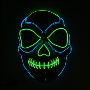 A skull mask illuminated with blue and green lights, featuring a detailed skull design. It has a glossy finish and is unbranded.