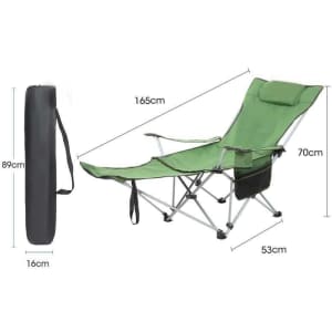 A green camping lounge chair with a padded headrest and side pocket, shown alongside its foldable carrying case.
