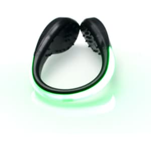 A green LED clip-on shoe light with a black plastic base, designed for outdoor leisure activities.