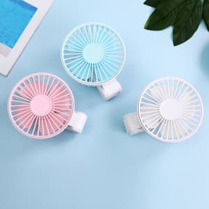 A set of three rechargeable folding hand-held fans in pink, blue, and white, featuring a clip for easy attachment.