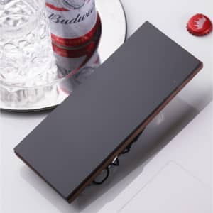 A black and brown drink bottle opener with a sleek design, featuring a logo.