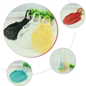 A collection of cotton mesh bags in various colours: black, white, yellow, red, and teal. Each has a handle and a logo.