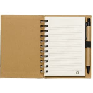 A recycled jotter notepad notebook in brown with a spiral binding and a black pen attached.
