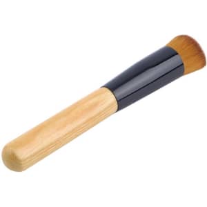 A makeup brush with a wooden handle and a black ferrule, featuring soft bristles for application.