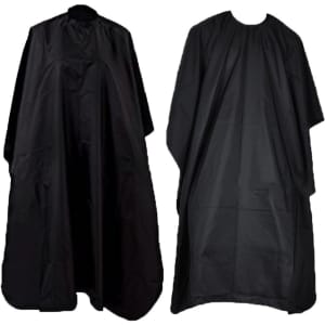 Two black hair cutting smocks with a loose, flowing design for salon use. Each smock features a neckline with no visible logos.