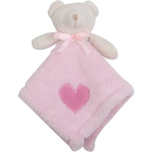 A soft pink baby blanket featuring a teddy bear head and a heart motif, with a ribbon on the bear's neck.