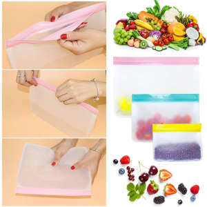 Food storage bags in various sizes and colours, with fruits and vegetables displayed nearby. Features a logo on the bags.