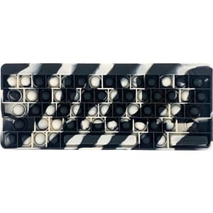 A fidget keyboard featuring a black and white zebra-striped design with poppable keys.