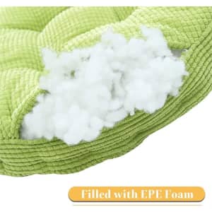 A round green seat cushion filled with EPE foam, featuring a textured surface and visible inner filling.