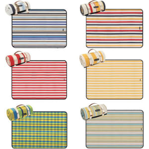 A collection of picnic blankets in various striped patterns, featuring rolled blankets in coordinating colours.