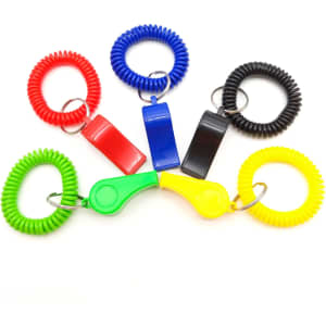 A set of novelty whistles with colourful coiled grips in red, blue, black, green, and yellow. Each whistle has a keyring attachment.