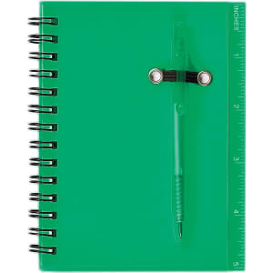 A green spiral notebook featuring a pen attached, with a ruler printed along the side.