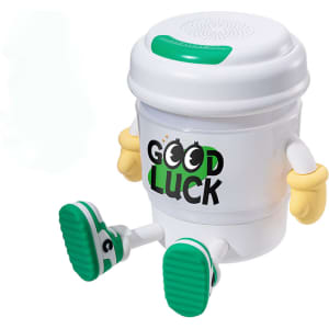 A coffee cup-shaped lamp and Bluetooth speaker in white, with green accents and arms, featuring a 'Good Luck' logo.