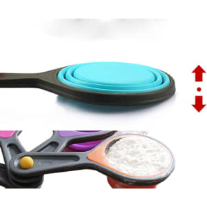 A set of three pop out silicone measuring cups in various vibrant colours, stacked and displayed on a flat surface.