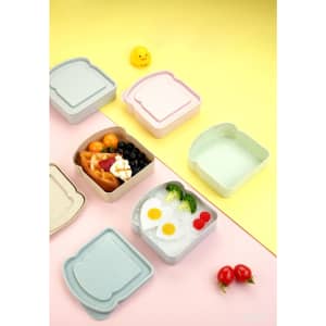A set of colourful wheat straw bread boxes in pastel pink, blue, and green, featuring various food items inside.