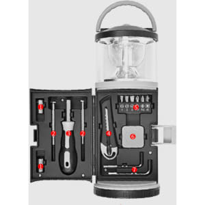 An expedition LED lantern in black and grey, featuring a detachable tool set with various tools inside.