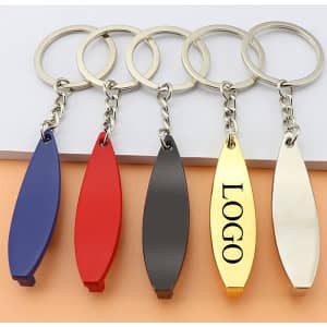 A surfboard-shaped keychain in blue, red, black, gold, and silver, attached to keyring chains.