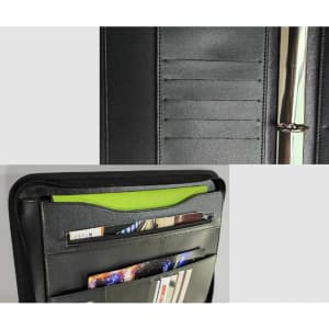 A black ring binder featuring multiple card slots, a flat pocket, and a metallic ring mechanism.