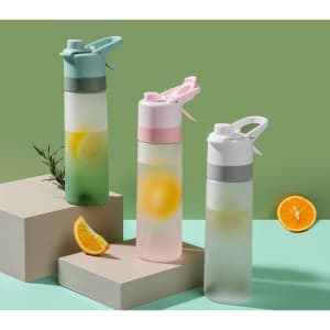 A drink bottle trio in pastel colours: green, pink, and grey, featuring citrus slices and a logo on each.