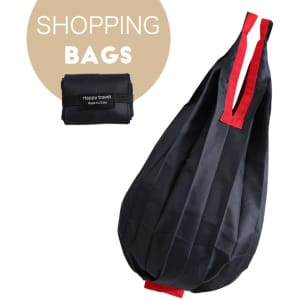 A foldable shopping bag in black with red accents, featuring a handle and a compact, folded design.