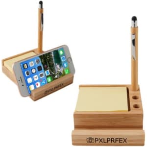 A bamboo desk organiser with a phone holder, featuring sections for a pen and sticky notes. It has a logo.