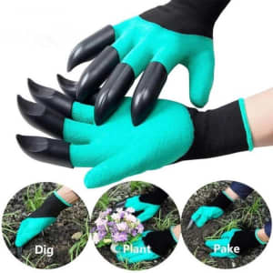Clawed garden gloves in turquoise with black claw-like tips, displayed on hands in a gardening setting.