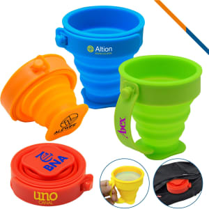 A set of foldable silicone travel cups in blue, green, orange, and red, featuring various logos.