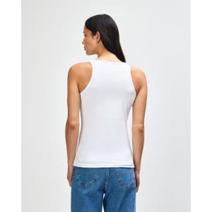 A white women's racerneck tank top, featuring a fitted design and a logo on the back.