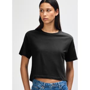 A black women's fine jersey boxy T-shirt with a relaxed fit, featuring a round neckline and short sleeves.
