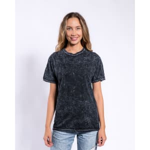 A woman models a black mineral wash adult T-shirt, featuring a casual fit and a subtle distressed look.