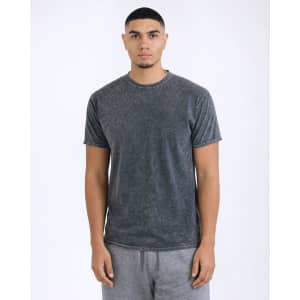 A grey Mineral Wash Adult T-Shirt displayed on a model, featuring a soft texture and classic fit.