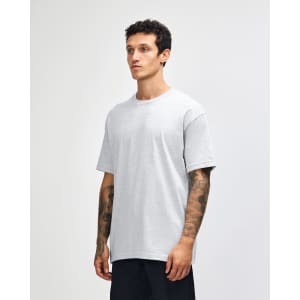 A heavyweight cotton unisex T-shirt in light grey, featuring a crew neck and short sleeves. It has a logo on it.