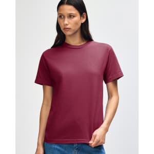 A maroon heavyweight cotton unisex T-shirt with short sleeves and a simple design. It has a logo on the chest.