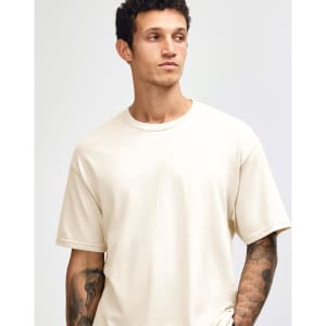 A heavyweight cotton unisex T-shirt in cream, featuring a simple design and a slight stretch fit.