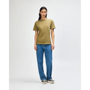 A unisex heavyweight cotton T-shirt in olive green, paired with light blue cargo pants. A logo is present.