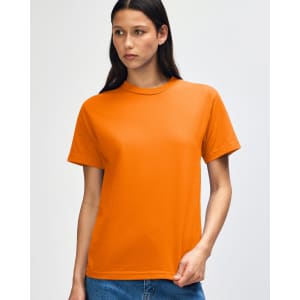 An orange heavyweight cotton unisex T-shirt displayed on a model with a neutral background.