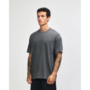 A unisex heavyweight cotton t-shirt in a slate grey colour, featuring a relaxed fit and a logo.