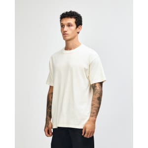 A unisex garment dyed heavyweight cotton t-shirt in off-white, featuring a casual fit and short sleeves.
