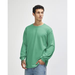 A lightweight cotton unisex long sleeve T-shirt in a soft mint colour with a relaxed fit. It features a logo on the chest.