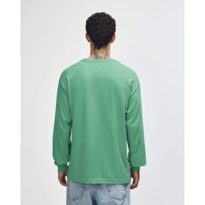 A unisex long sleeve T-shirt in light mint green, featuring a simple design and a logo on the back.