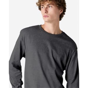 A heavyweight cotton unisex long sleeve t-shirt in dark grey, featuring a classic crew neckline and a logo.