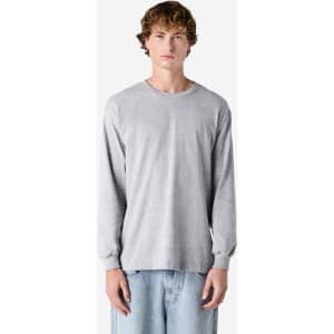 A unisex long sleeve t-shirt in light grey, featuring a round neckline and a simple design. It has a logo on it.