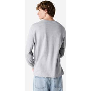 A unisex long sleeve T-shirt in grey, featuring a subtle logo on the back.