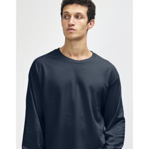 A unisex long sleeve T-shirt in navy blue, featuring a simple design and a logo on the front.