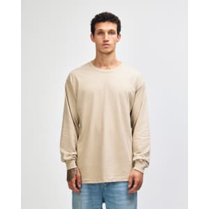A lightweight cotton unisex long sleeve T-shirt in a neutral beige colour, featuring a logo.