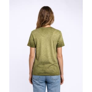 A back view of a green Colortone® Oil Wash T-Shirt on a model, featuring a casual fit.
