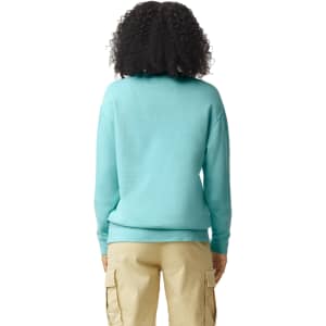 A lightweight crewneck sweatshirt in aqua, featuring a back view of the model wearing it. The design includes a logo.
