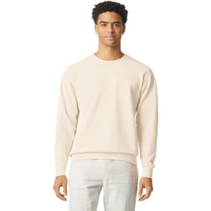 A lightweight crewneck sweatshirt in a neutral beige colour, featuring a minimalist design and a branded logo.