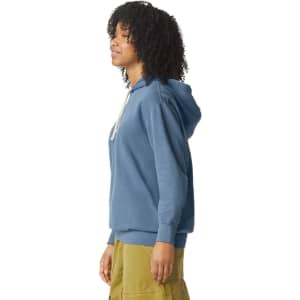 A lightweight hooded sweatshirt in blue, featuring a drawstring hood, side view of a model.