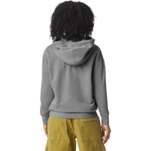 A grey lightweight hooded sweatshirt with a kangaroo pocket, featuring a logo on the back, paired with cargo pants.